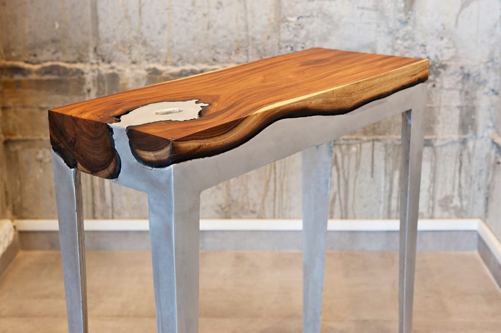 Sleek Furniture Collection by Hilla Shamia Harmonizes Cast Aluminum and Natural Wood [Ebert]