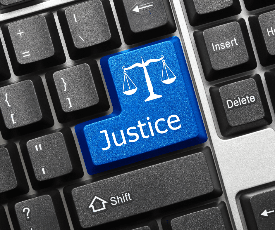 Picture of a keyboard with the word Justice on one of the keys - clicking on this image will take you to an article called Technology and Access to Justice: How Does It Work?