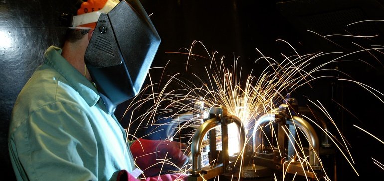 A person practicing their welding skills